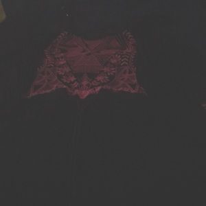 This is a long black sun dress, pink design .